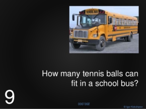 how many tennis balls can fit in a school bus